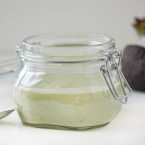 Avocado dressing a clear glass container
