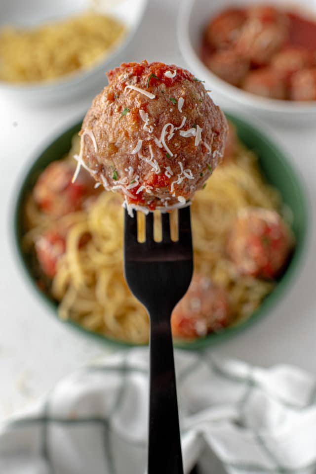 a meatball on a fork
