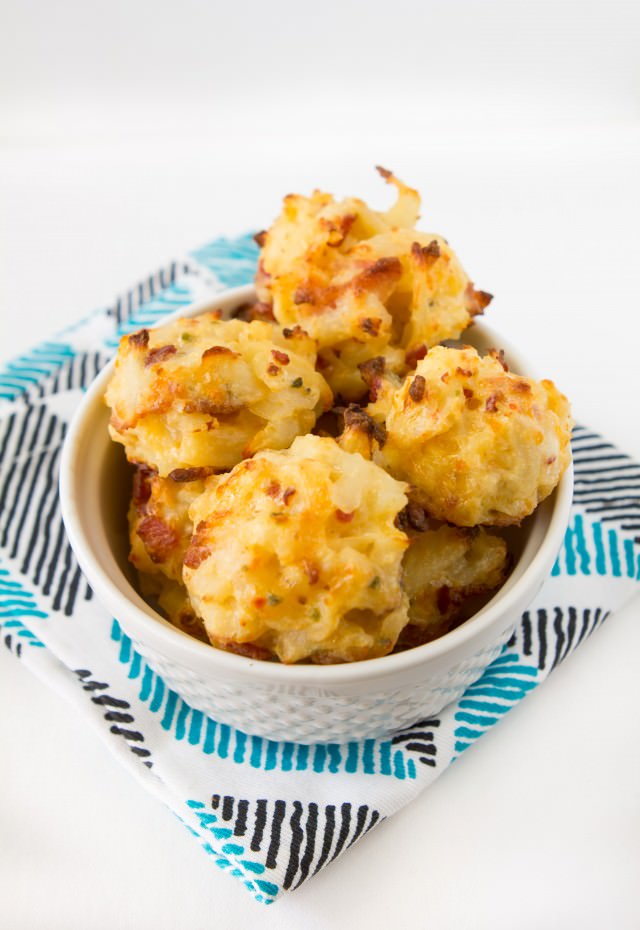 Loaded Potato Bites in a bowl with a napkin