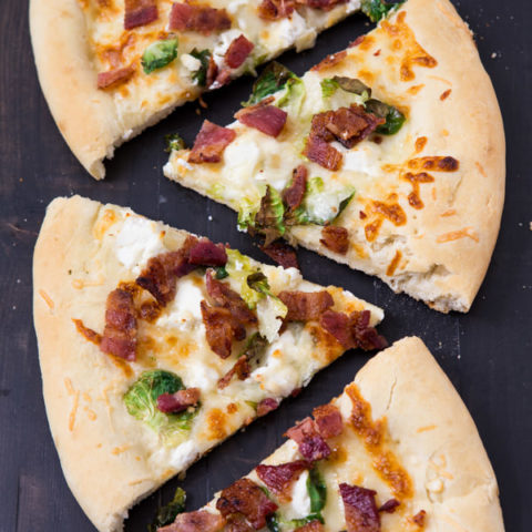 Goat cheese, bacon and brussels sprout pizza