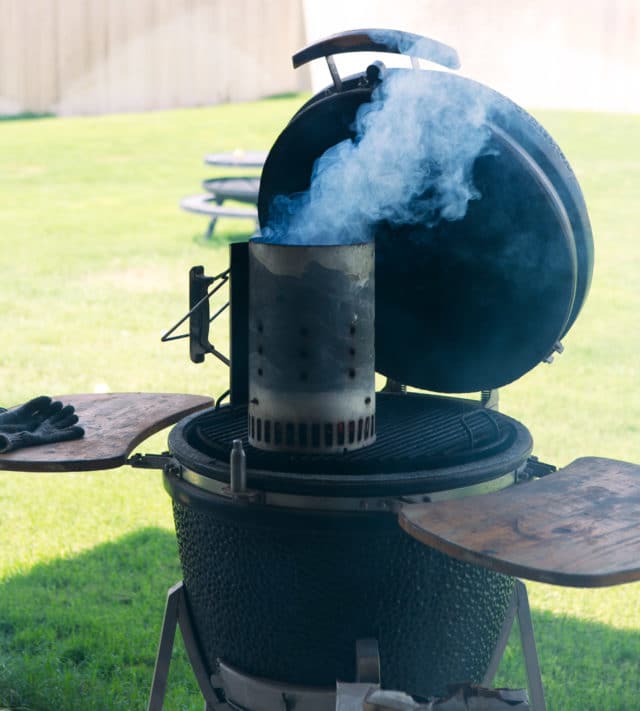 smoke coming out of a grill