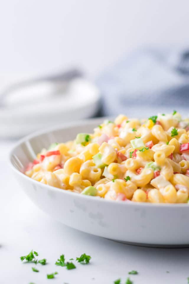 Macaroni Salad is a classic pasta dish that is easy to make with a simple ingredient list. This is a great side dish to bring to your next BBQ or social gathering.