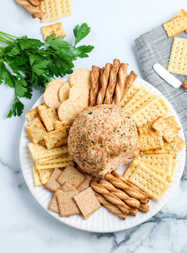 Cheese Ball with crackers surrounding 